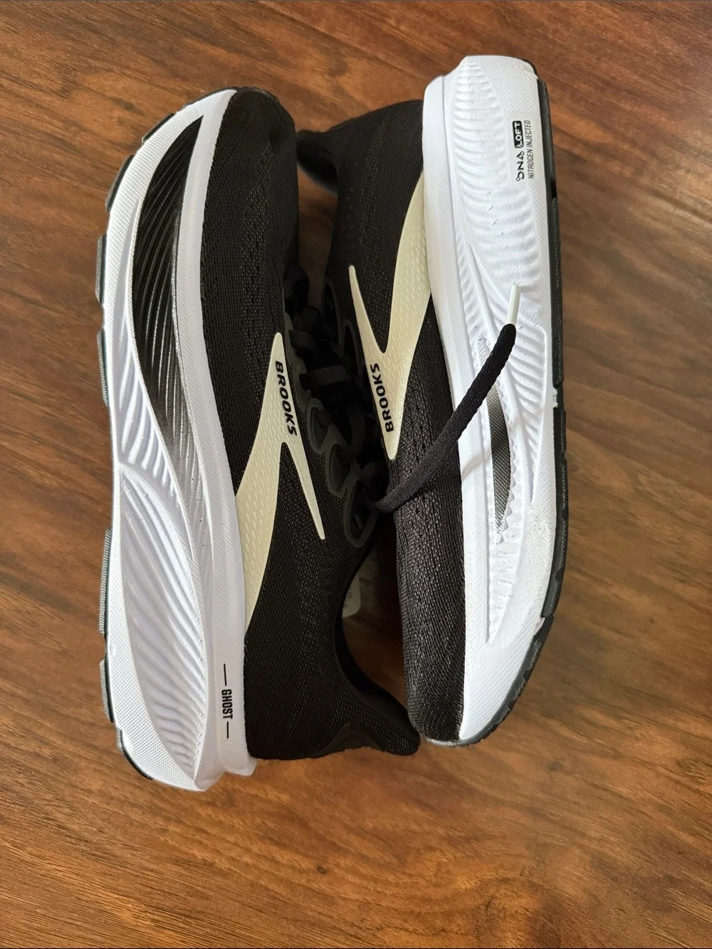 Black Athletic Running Shoes with White Midsole